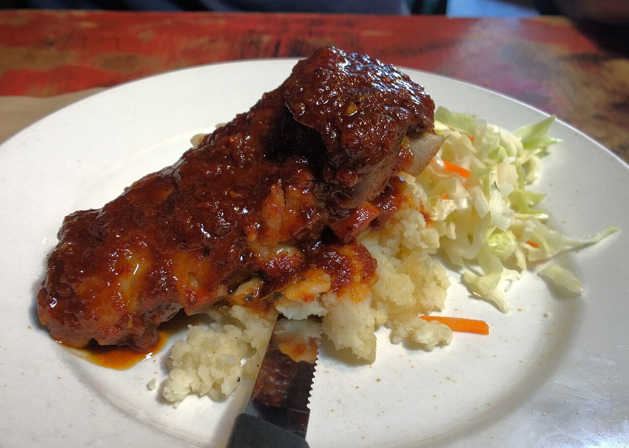 Jamaican jerk chicken served with vegetables